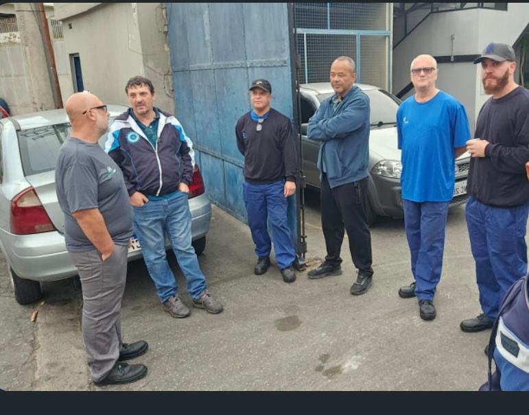 Diretor Alemão e equipe em ação com os trabalhadores das empresas MMD e NOVAK GOUVEIA